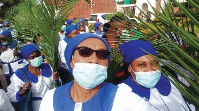 MERRY CROWDS FOR EASTER . . . gatherings resume after two-year hiatus